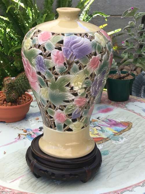 A Beautiful Signed Chinese Hand Painted Pierced Porcelain Vase on wood Stand