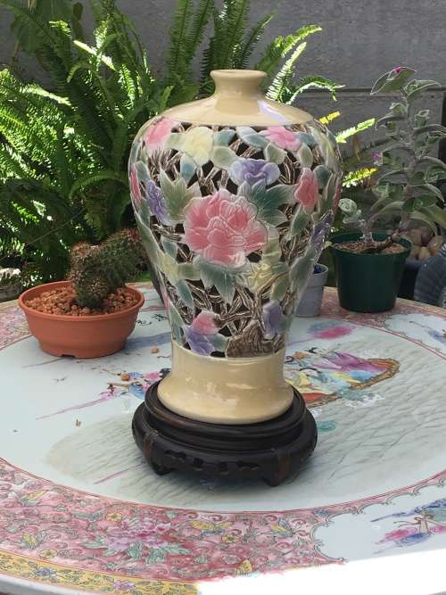 A Beautiful Signed Chinese Hand Painted Pierced Porcelain Vase on wood Stand