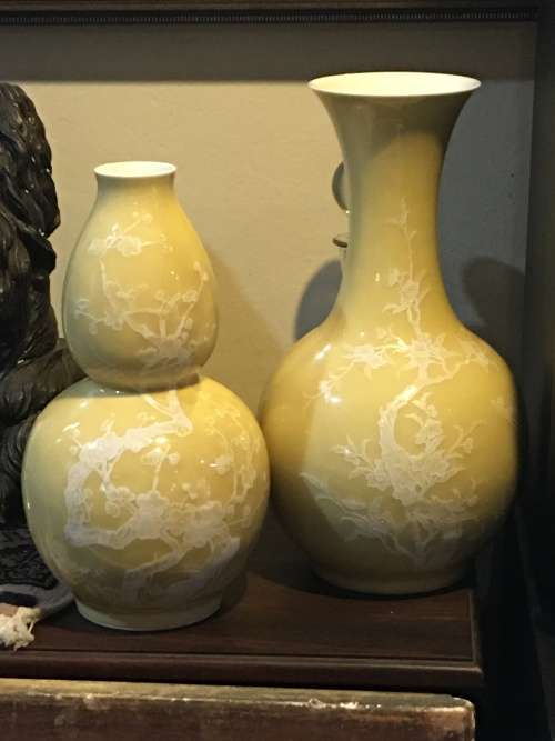Large Chinese Yellow Prunus Vase with white blossoms on Carved Wood Stand