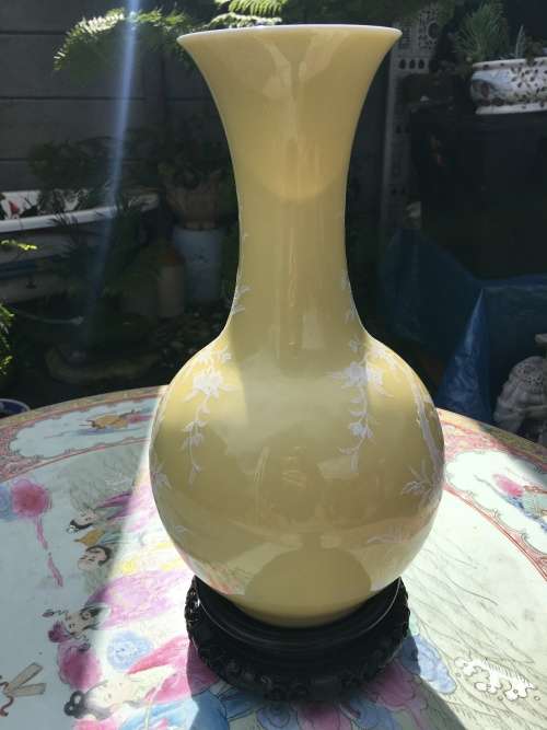 Large Chinese Yellow Prunus Vase with white blossoms on Carved Wood Stand