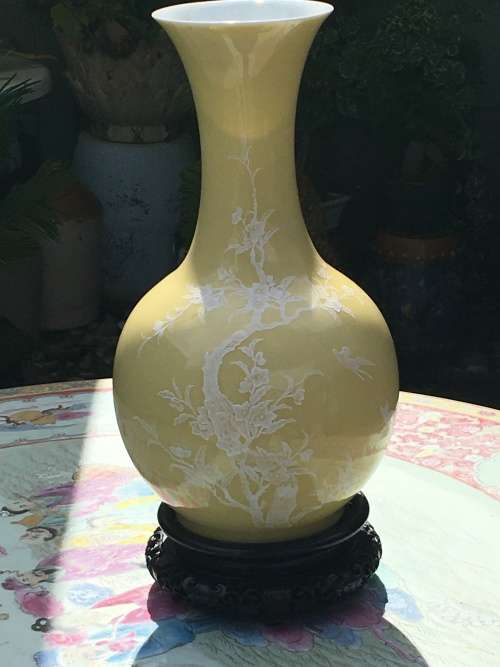 Large Chinese Yellow Prunus Vase with white blossoms on Carved Wood Stand