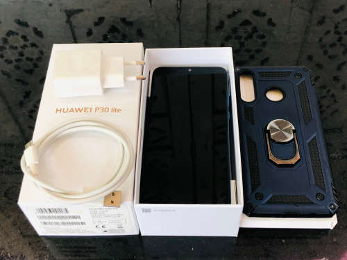 HUAWEI P30 LITE DUAL SIM - IN THE BOX - COMES WITH THE CHARGER AND CABLE - SIM KEY AND A COVER