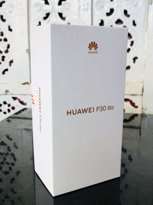 HUAWEI P30 LITE DUAL SIM - IN THE BOX - COMES WITH THE CHARGER AND CABLE - SIM KEY AND A COVER