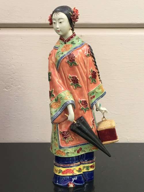 A Signed Chinese Shiwan female figurine hand sculpted and decorated. 30.5 cm tall