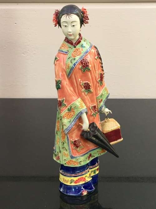 A Signed Chinese Shiwan female figurine hand sculpted and decorated. 30.5 cm tall