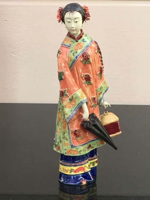 A Signed Chinese Shiwan female figurine hand sculpted and decorated. 30.5 cm tall