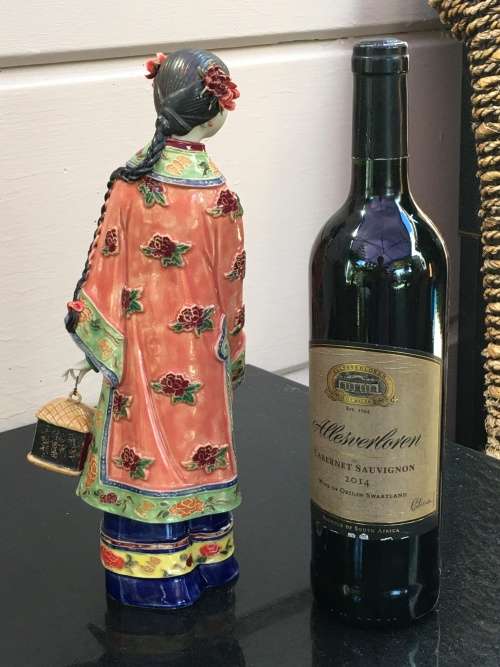 A Signed Chinese Shiwan female figurine hand sculpted and decorated. 30.5 cm tall