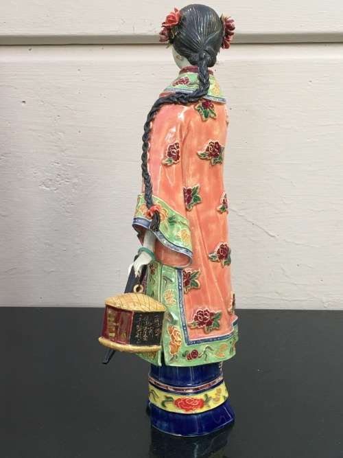 A Signed Chinese Shiwan female figurine hand sculpted and decorated. 30.5 cm tall