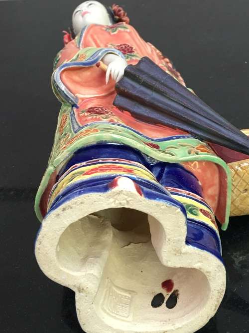 A Signed Chinese Shiwan female figurine hand sculpted and decorated. 30.5 cm tall