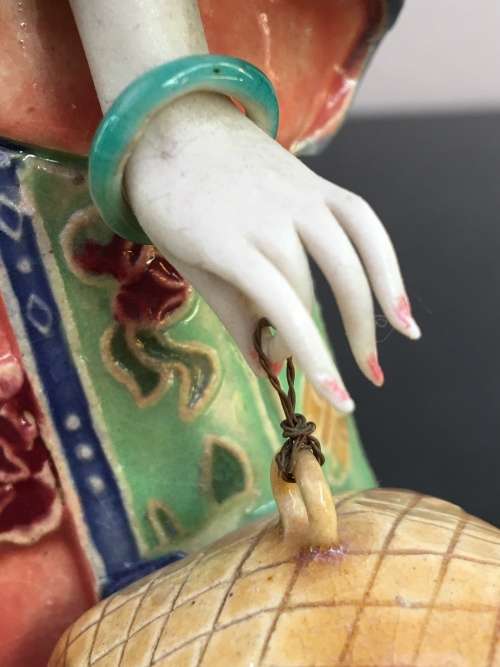 A Signed Chinese Shiwan female figurine hand sculpted and decorated. 30.5 cm tall