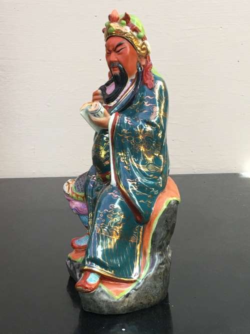 Vintage Signed Chinese Shiwan male figurine hand sculpted and decorated.