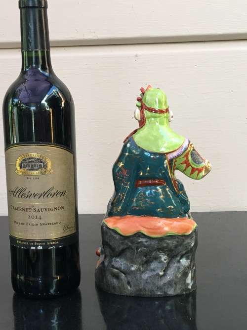 Vintage Signed Chinese Shiwan male figurine hand sculpted and decorated.