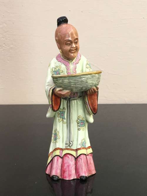 Antique Chinese Shiwan male figurine hand sculpted and decorated.