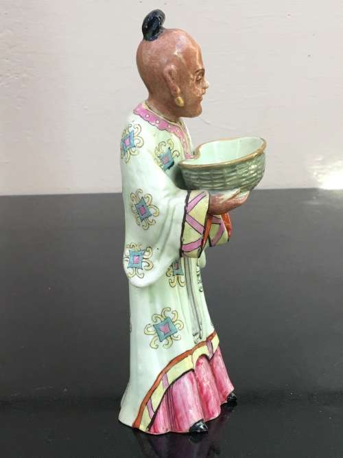 Antique Chinese Shiwan male figurine hand sculpted and decorated.