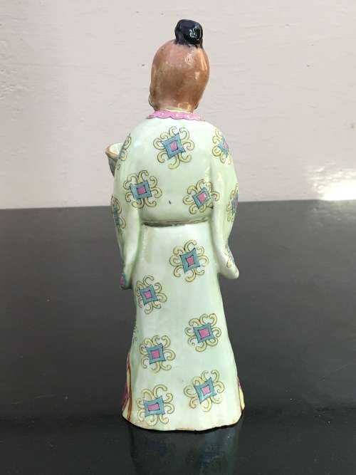 Antique Chinese Shiwan male figurine hand sculpted and decorated.