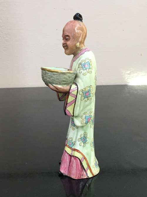 Antique Chinese Shiwan male figurine hand sculpted and decorated.