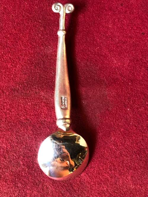 CARROL BOYES (1954 - 2019) FUNCTIONAL ART ARIES PATTERN SUGAR SPOON - CLEARLY MARKED