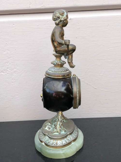 A FIRE GILDED BRONZE ON MARBLE BASE SWISS MADE FRENCH MANTLE CLOCK - WORKING 100%