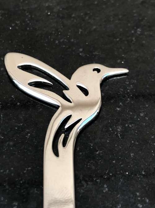 CARROL BOYES (1954 - 2019) HUMMINGBIRD PATTERN STAINLESS STEEL SUGAR SPOON