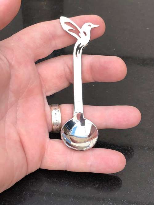 CARROL BOYES (1954 - 2019) HUMMINGBIRD PATTERN STAINLESS STEEL SUGAR SPOON