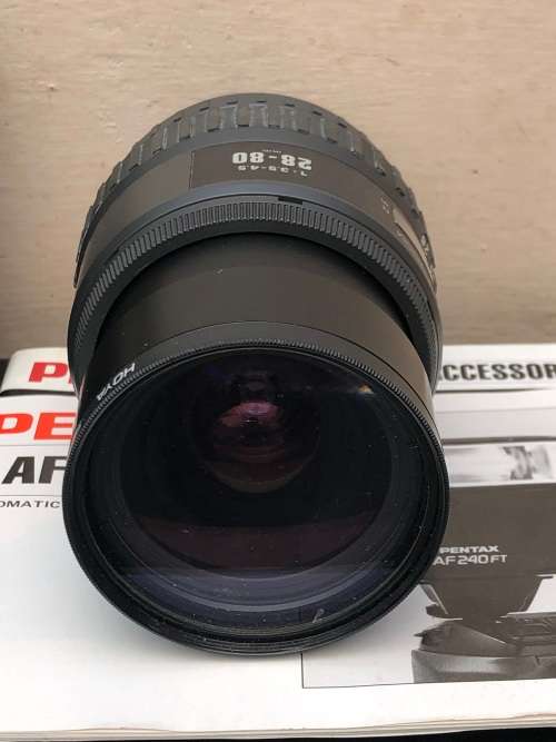 PENTAX SF7 35mm SLR FILM CAMERA WITH EXTRA LENS MANUALS AND AN AF 240FT FLASH IN CARRY BAG