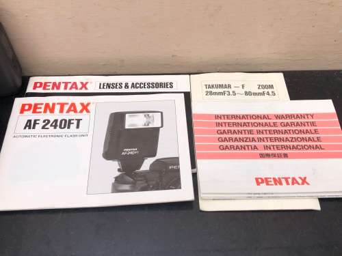 PENTAX SF7 35mm SLR FILM CAMERA WITH EXTRA LENS MANUALS AND AN AF 240FT FLASH IN CARRY BAG