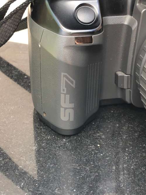 PENTAX SF7 35mm SLR FILM CAMERA WITH EXTRA LENS MANUALS AND AN AF 240FT FLASH IN CARRY BAG