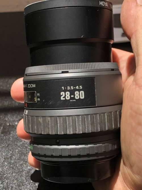 PENTAX SF7 35mm SLR FILM CAMERA WITH EXTRA LENS MANUALS AND AN AF 240FT FLASH IN CARRY BAG