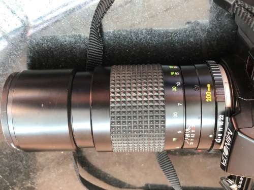 MINOLTA X-300s 35mm SLR MANUAL ZOOM FILM CAMERA WITH TWO LENSES IN A CARRY CASE -WORKING 100%