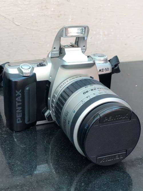 PENTAX MZ-50 35mm SLR FILM CAMERA WITH EXTRA LENS MANUALS FLASH AND CAMERA BAG