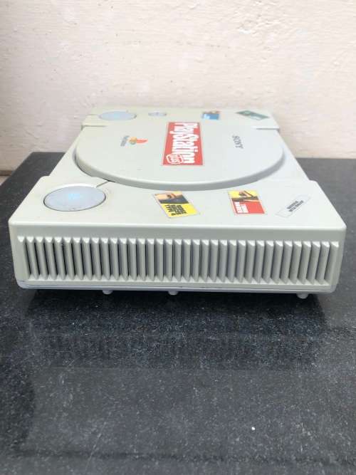 ORIGINAL PLAYSTATION CONSOLE WITH REMOTES , MEMORY CARDS AND 4 ORIGINAL GAMES - WORKING