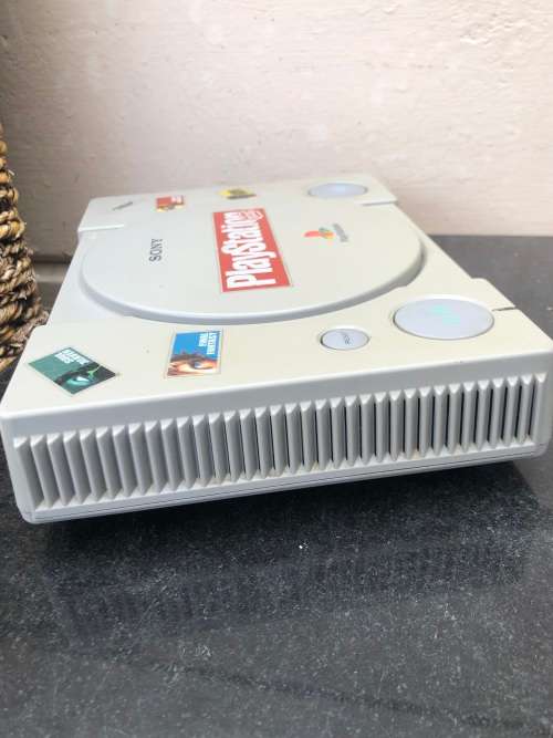 ORIGINAL PLAYSTATION CONSOLE WITH REMOTES , MEMORY CARDS AND 4 ORIGINAL GAMES - WORKING