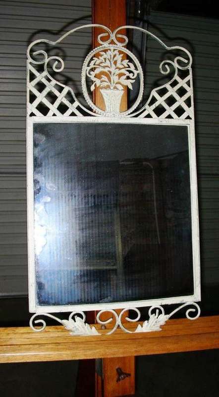 Vintage Cast metal cream mirror with antiqueing finish