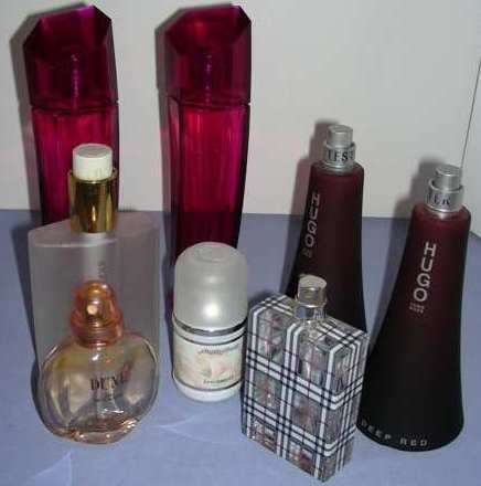 11 x perfume / body creme bottles