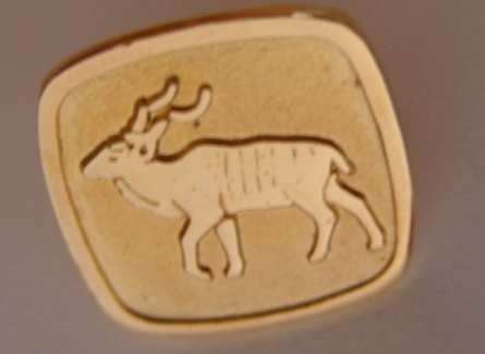 Gold plated Buck badge