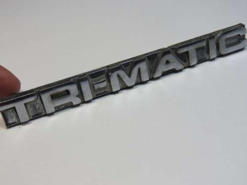 CHEV Tri-Matic metal badge - One broken pin