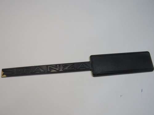 Vintage Nissan Stanza plastic car badge