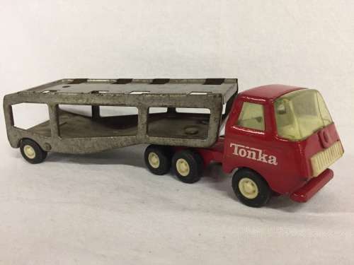 Vintage Tonka toy truck with transport carrier trailer