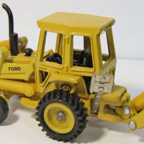 ERTL Ford 555B Backhoe with front loader construction model - Scale 1/64