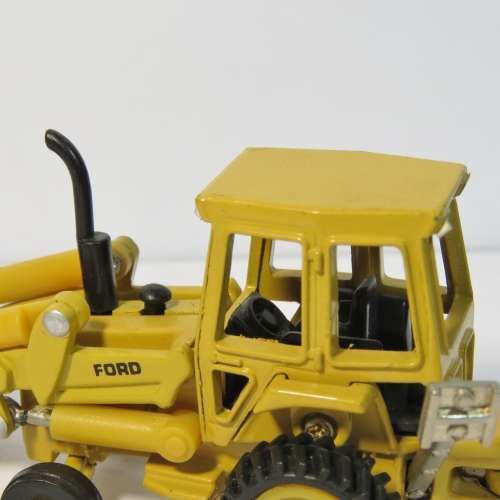 ERTL Ford 555B Backhoe with front loader construction model - Scale 1/64