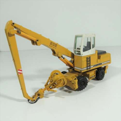 Conrad #2832 Liebherr 932 Litronic excavator with grapple die-cast construction model - Scale 1/50