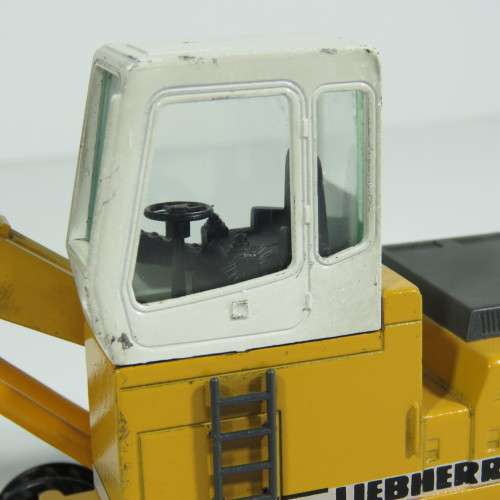 Conrad #2832 Liebherr 932 Litronic excavator with grapple die-cast construction model - Scale 1/50