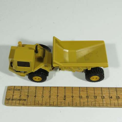 ERTL Caterpillar D25D articulated dump truck die-cast construction model - Scale 1/64