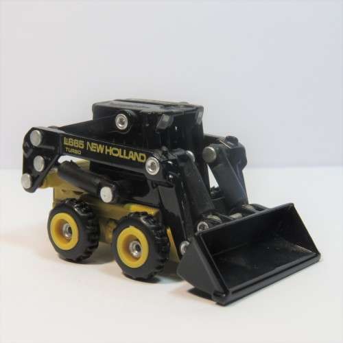 ERTL New Holland L665 Turbo skid steer loader - Scale 1/32