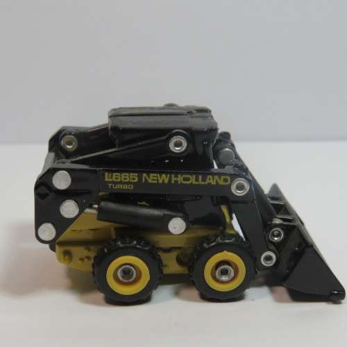 ERTL New Holland L665 Turbo skid steer loader - Scale 1/32