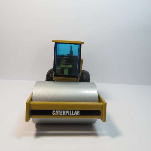 NZG Modelle 1995 #401/2 caterpillar CS-583C vibratory roller construction model - Scale 1/50