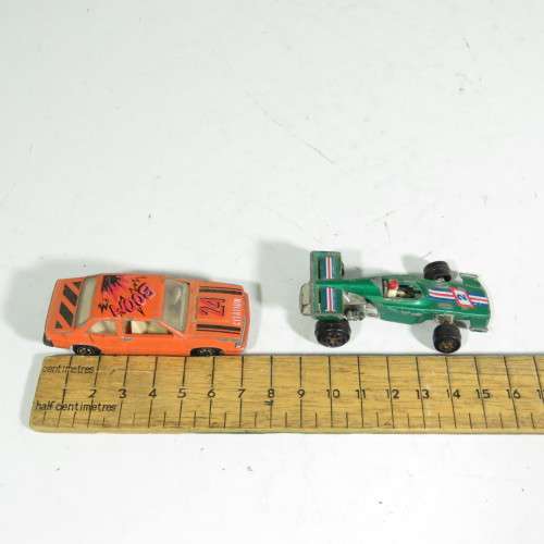Lot of 4 vintage Yatming racing toy cars