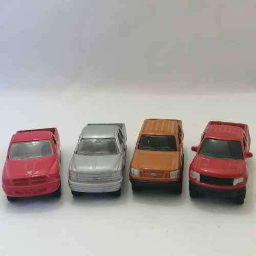 Lot of 4 Maisto pickup trucks
