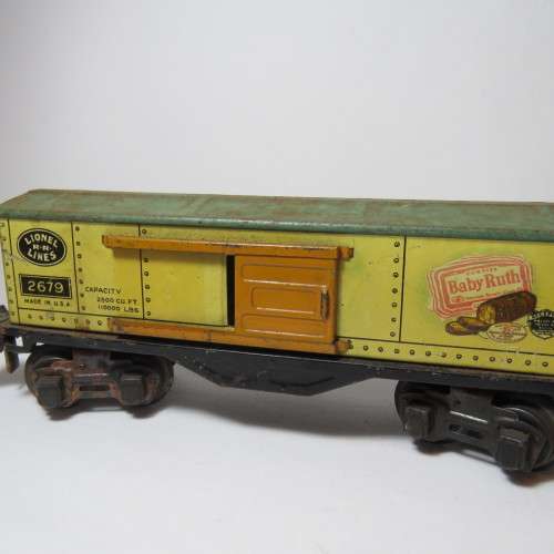 Lionel Lines 2679 Tin Train Wagon - Babe Ruth with sliding doors - Some rust on wheels - O-Gauge