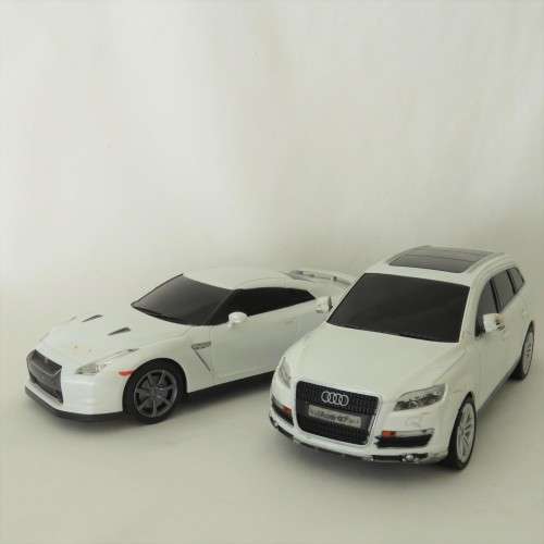 Pair of RASTAR remote control cars - Not tested - No remotes - 27 MHZ